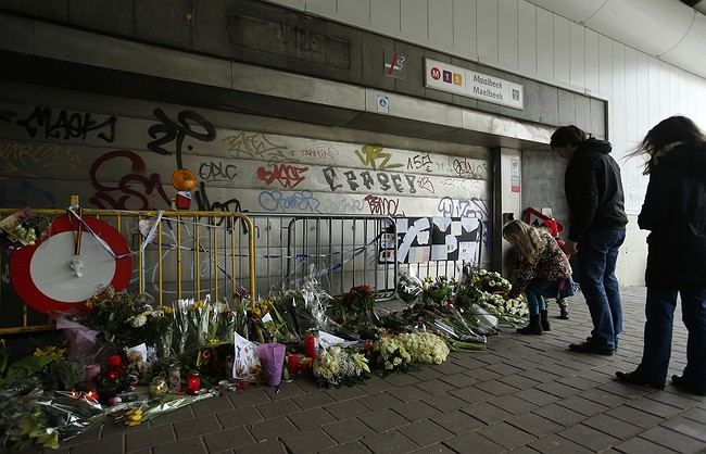Three explosions in Belgian police raid of Brussels neighborhood